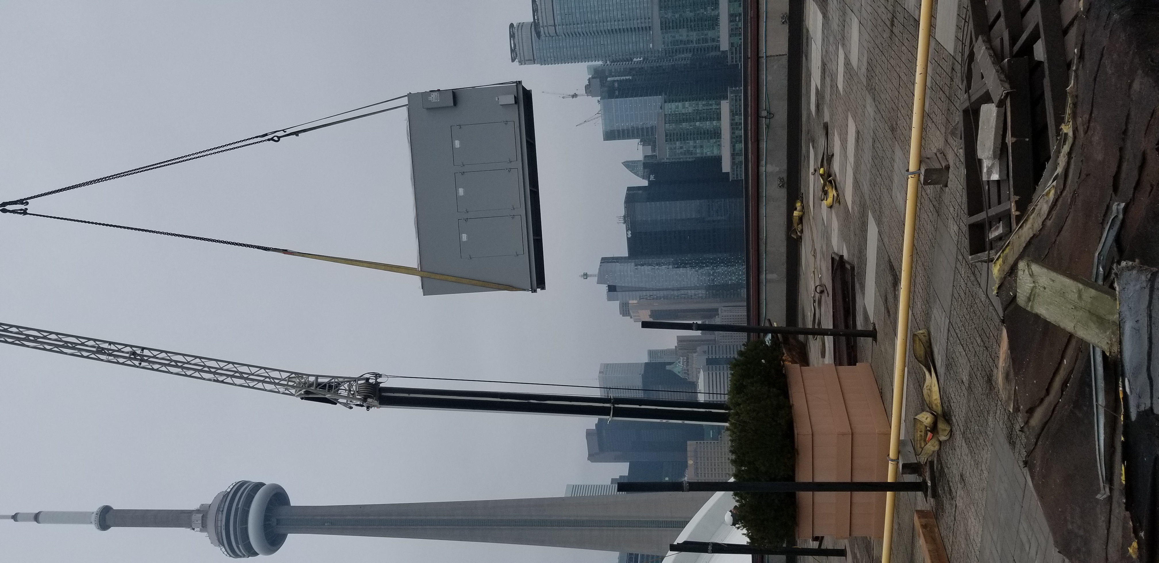 Temperature Control Solutions HVAC installation with CN Tower in background